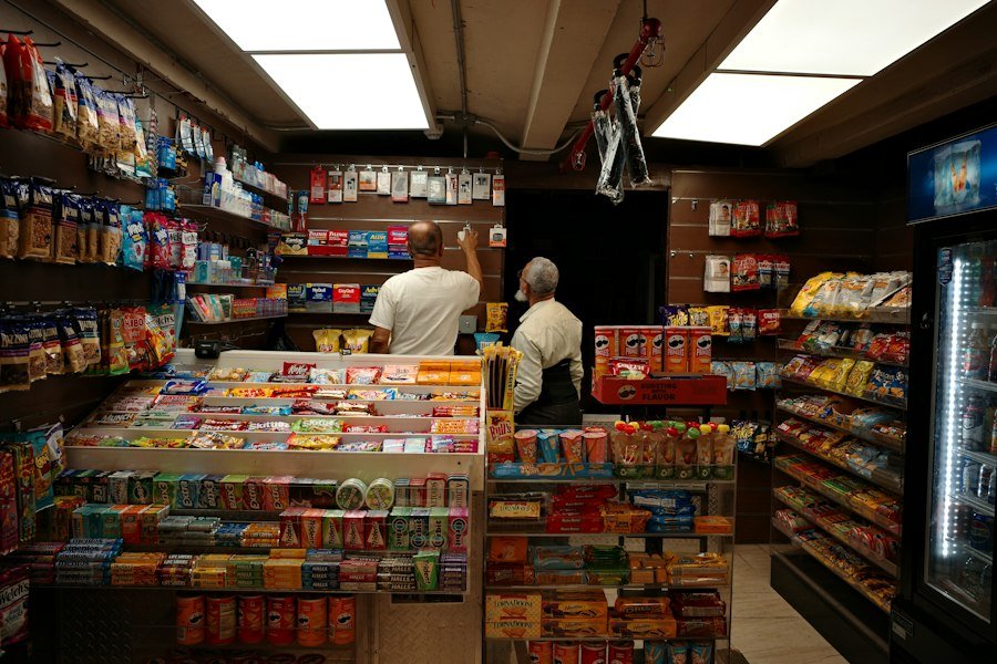 Convenience store with stocked product shelves